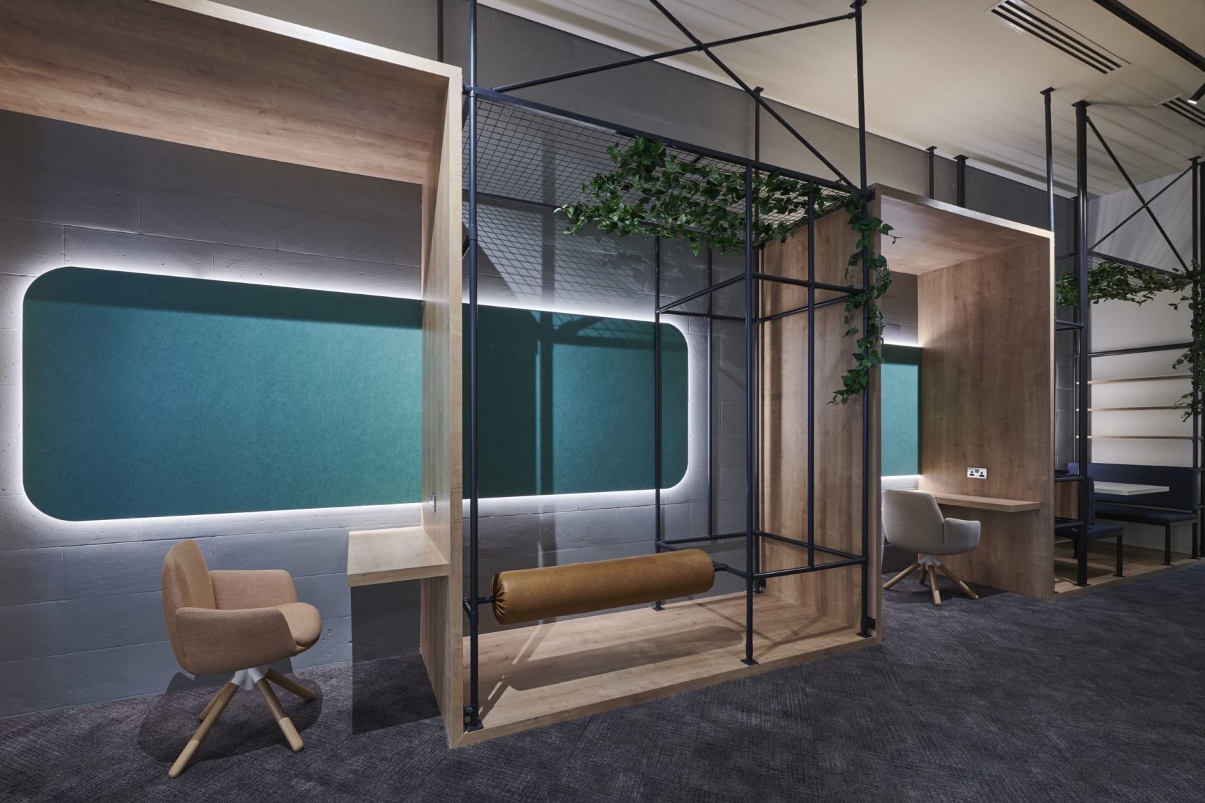 Individual work areas with integrated lighting at Aldar Headquarters
